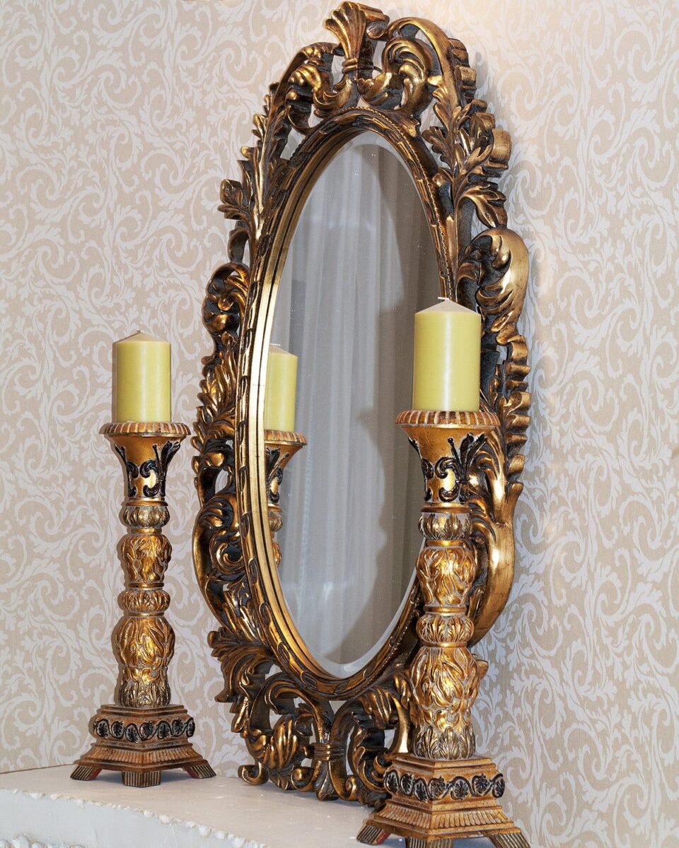 Золотое настенное зеркало овальной формы "Гойя" с переплетающимися элементами (вид сбоку)