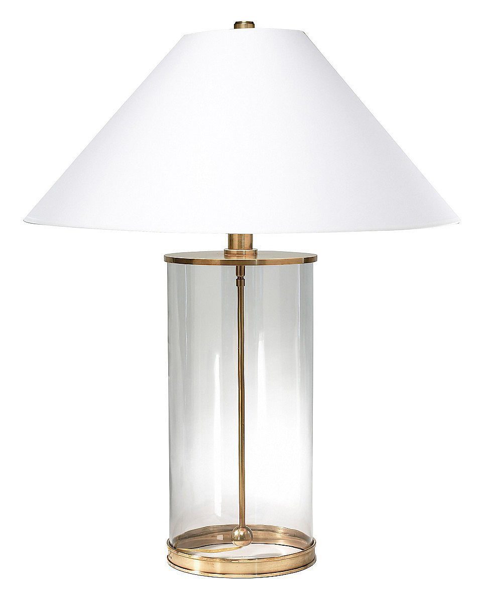 Золотая настольная лампа "Сандерс", основание сделано из прозрачного стекла в виде тубуса.