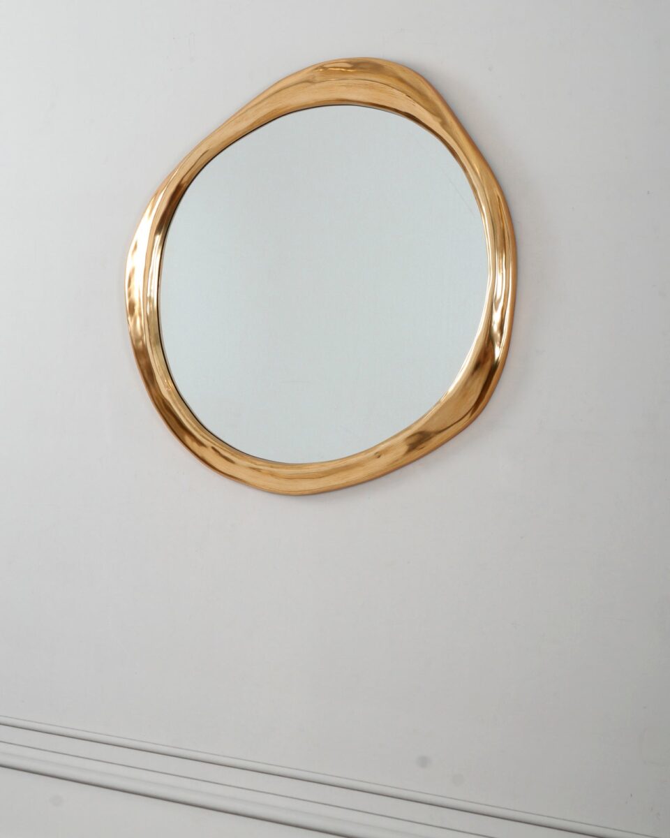 Круглое золотое ассиметричное зеркало 